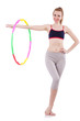 Woman doing exercises with hula hoop