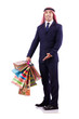 Photo: Arab man with shopping gifts on white Arab man with shopping gifts on white