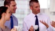 Business people having a coffee together