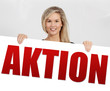 Aktion blonde Frau hält Schild
