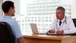 Doctor asking questions to his patient