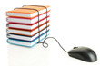 Foto: Stack of books connecting to a computer mouse Stack of books connecting to a computer mouse