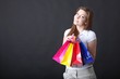 young woman with shopping bags