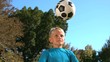 Video: Young boy heading a football Young boy heading a football