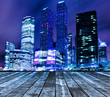 Photo: modern glass silhouettes of skyscrapers at night modern glass silhouettes of skyscrapers at night