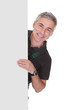 Photo: Mature Male Gardner Holding Placard Mature Male Gardner Holding Placard