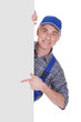 Photo: Mature Male Technician Pointing On Placard Mature Male Technician Pointing On Placard