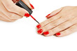 Manicure. Applying red nail polish