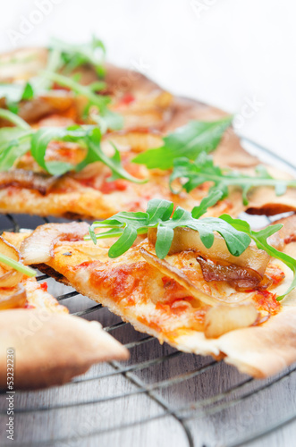 Photo: Thin crust pizza slice or flat bread Thin crust pizza slice or flat bread