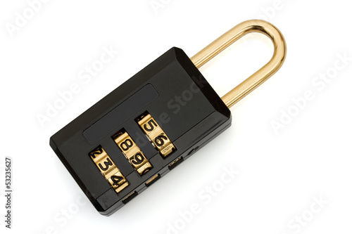 Photo: Closeup of a black and gold combination lock isolated on white Closeup of a black and gold combination lock isolated on white