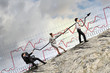 Photo: Businesspeople pulling graph Businesspeople pulling graph