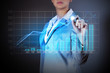 Foto: Business woman drowing media graphs Business woman drowing media graphs