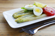 Asparagus and hardboiled egg, arugula, tomato