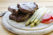 Beefsteaks and asparagus