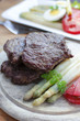 Beefsteaks and asparagus