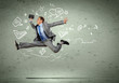 Photo: Jumping young businessman Jumping young businessman