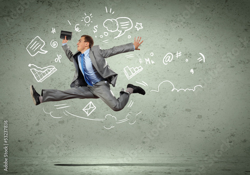 Photo: Jumping young businessman Jumping young businessman