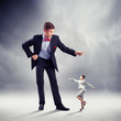 Businessman puppeteer