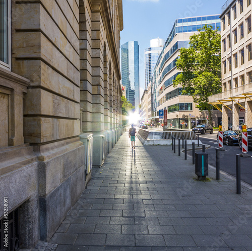 Photo: person on the sidewalk downtown Frankfurt person on the sidewalk downtown Frankfurt