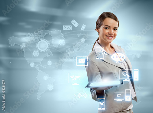 Photo: Businesswoman with tablet pc Businesswoman with tablet pc