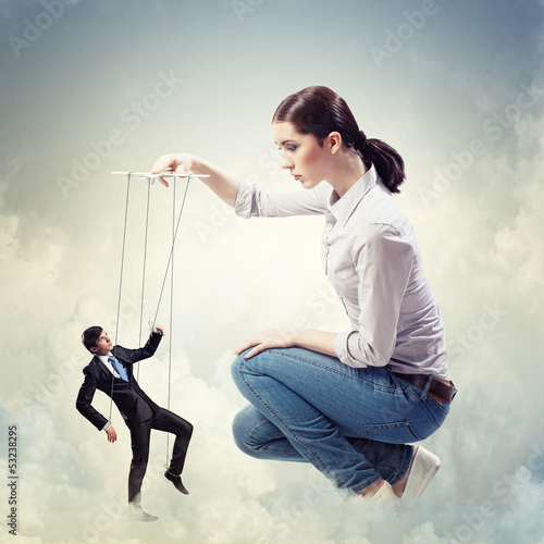 Photo: Businesswoman puppeteer Businesswoman puppeteer