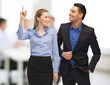man and woman pointing finger