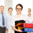 Photo: young attractive businesswoman with folders young attractive businesswoman with folders