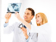 two doctors looking at x-ray