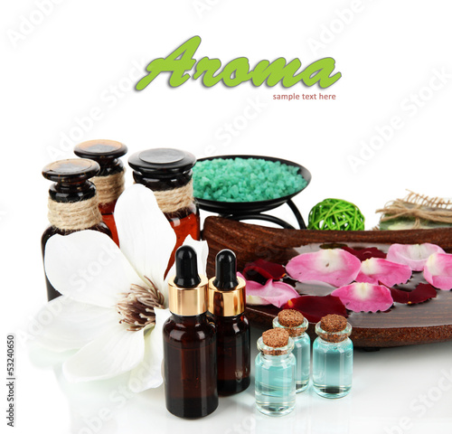 Photo: Spa composition with aroma oils isolated on white Spa composition with aroma oils isolated on white