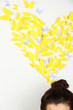 Paper yellow butterflies fly thoughts out of head