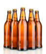 Photo: Beer bottles isolated on white Beer bottles isolated on white
