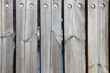 Photo: Weathered boards and bolts of wooden fence Weathered boards and bolts of wooden fence
