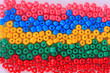 Different colorful beads close-up