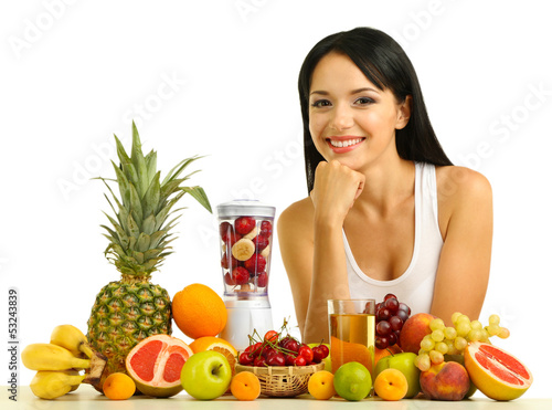 Photo: Girl with fresh fruits isolated on white Girl with fresh fruits isolated on white