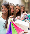 Shopping women in a row