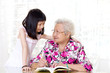 Asian senior woman and her granddaughter