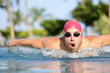 Photo: Swimmer man swimming butterfly strokes in pool Swimmer man swimming butterfly strokes in pool