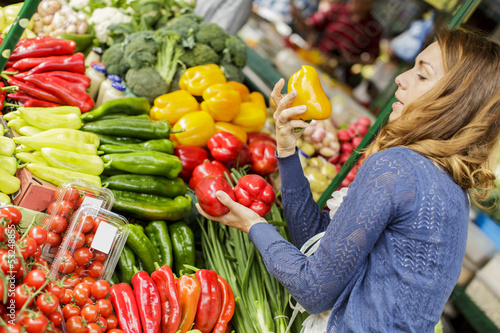 Photo: Young woman at the market Young woman at the market