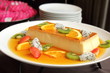 Delicious creme caramel dessert with fruit