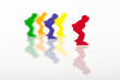 Five colored pawns isolated on a white background