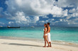 Photo: Couple on a beach at Maldives Couple on a beach at Maldives