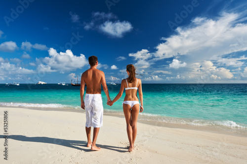 Photo: Couple on a beach at Maldives Couple on a beach at Maldives