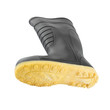 Under rubber black boot shoe on white background.