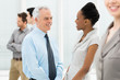 Photo: Business People Talking With Each Other Business People Talking With Each Other