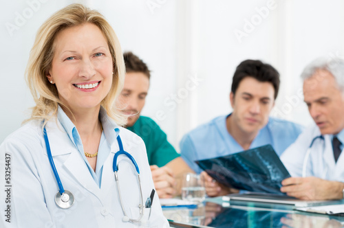 Photo: Portrait Of Senior Female Doctor Portrait Of Senior Female Doctor
