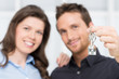 Foto: Young Couple Showing Keys Of New House Young Couple Showing Keys Of New House