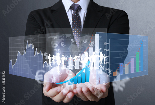 Photo: financial symbols coming from hand financial symbols coming from hand