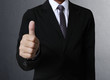 Bhand with thumb up