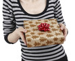 Young woman holding a present