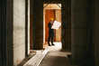 Photo: Architect standing in house under construction with building pla Architect standing in house under construction with building pla
